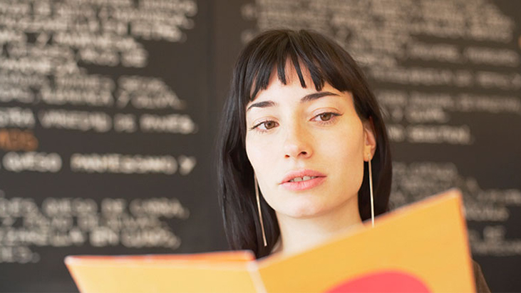 woman reading menu